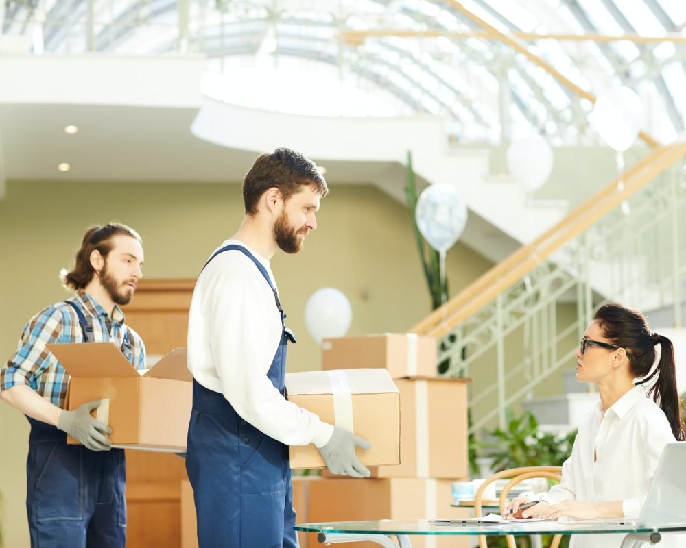 confident-logistics-manager-controlling-delivery-of-goods.jpg